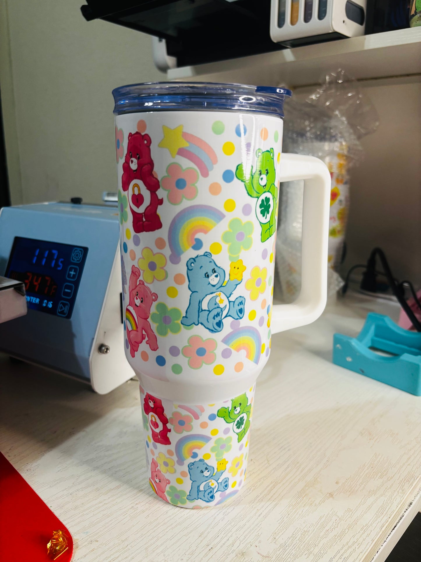 Flowers and rainbow carebears 40oz tumbler