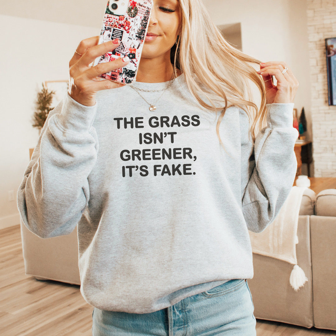 Grass isn’t greener Unisex Heavy Blend™ Crewneck Sweatshirt