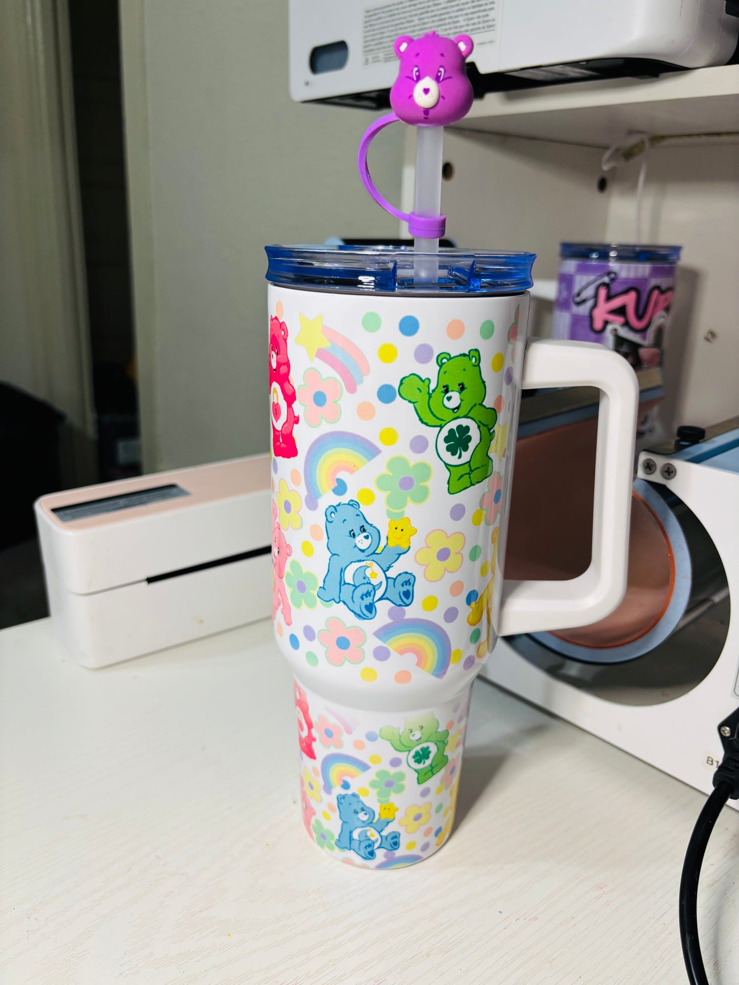 Flowers and rainbow carebears 40oz tumbler