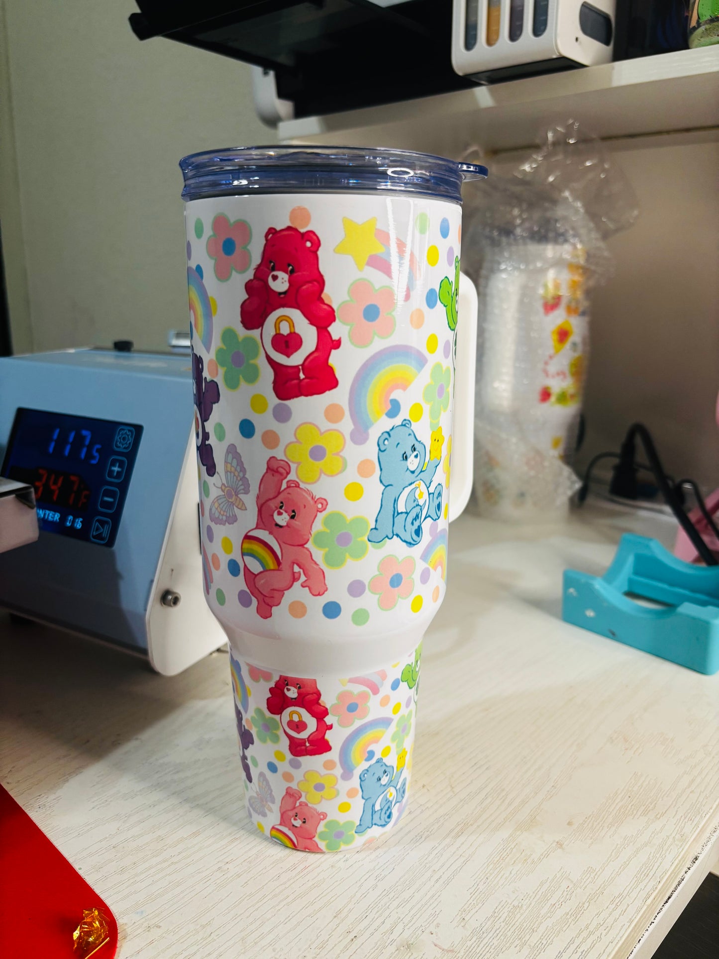 Flowers and rainbow carebears 40oz tumbler