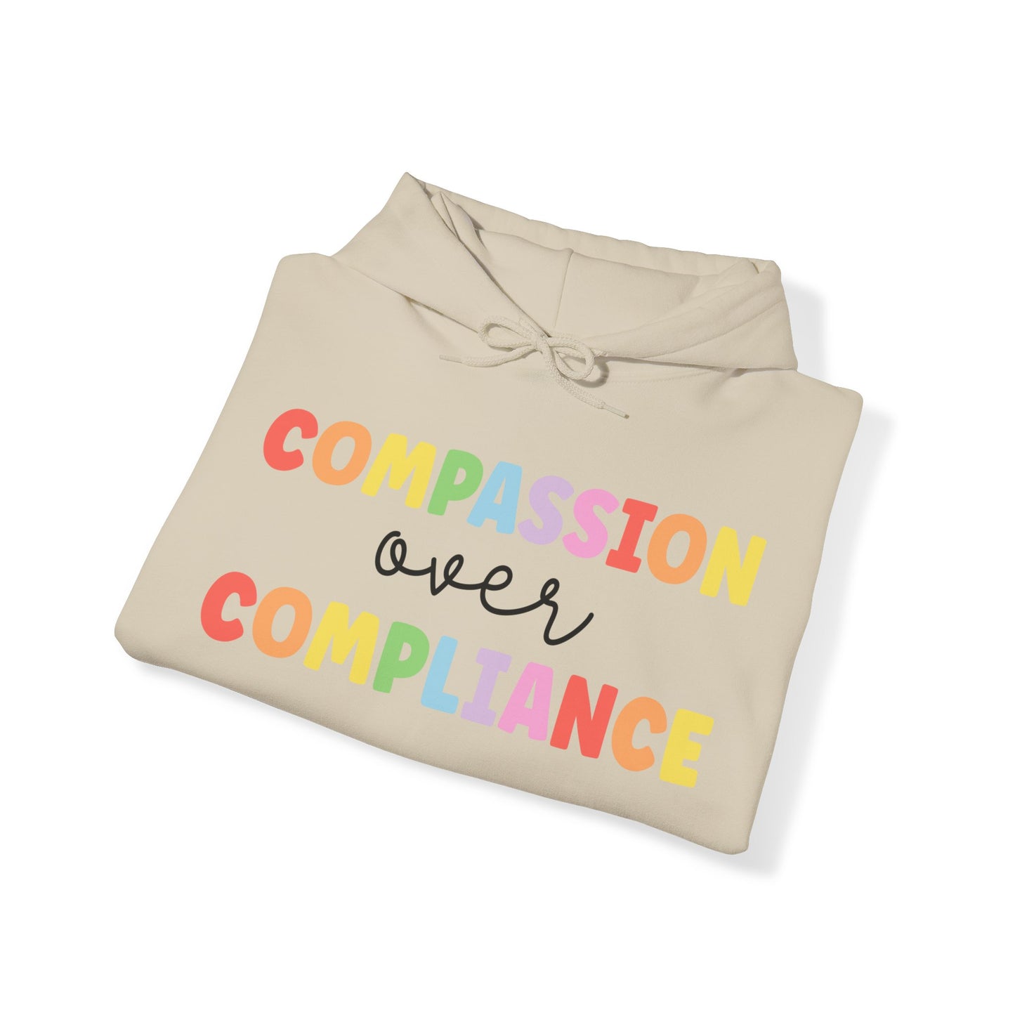 compassion over compliance Unisex Heavy Blend™ Hooded Sweatshirt