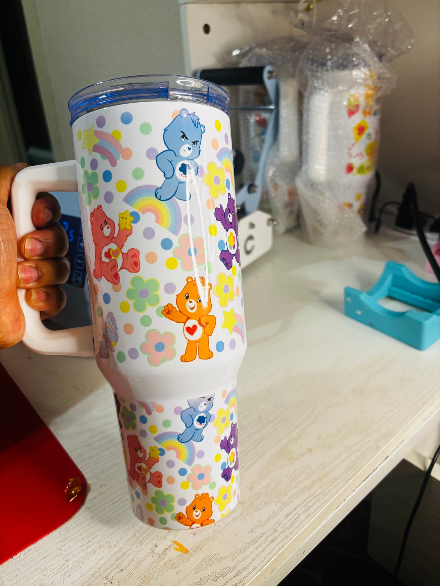 Flowers and rainbow carebears 40oz tumbler