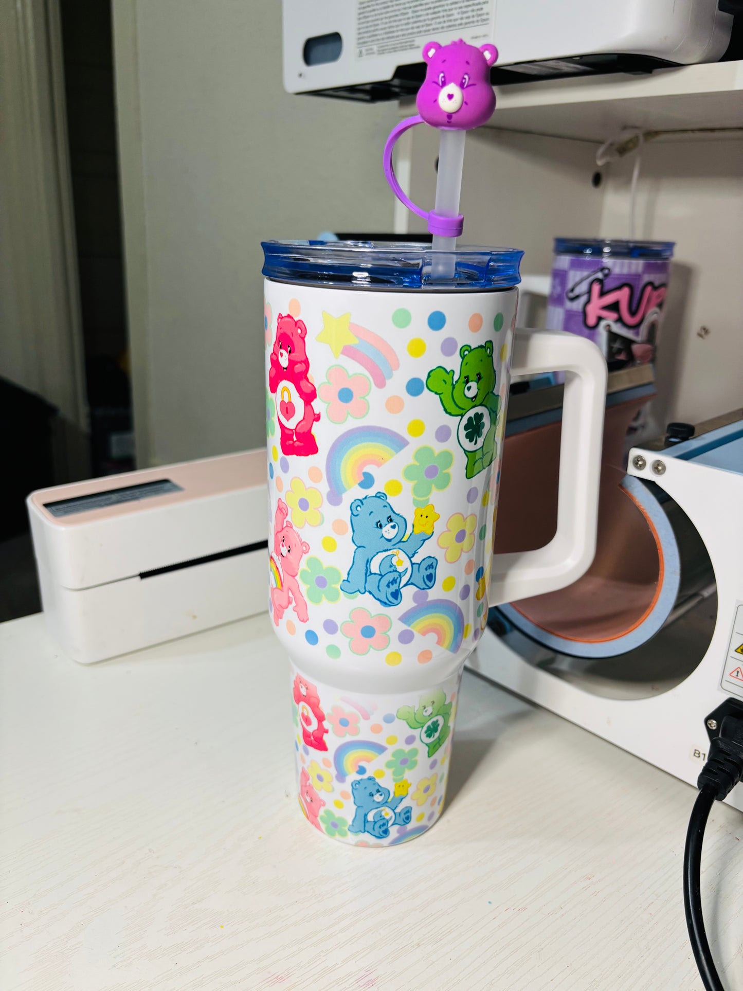 Flowers and rainbow carebears 40oz tumbler
