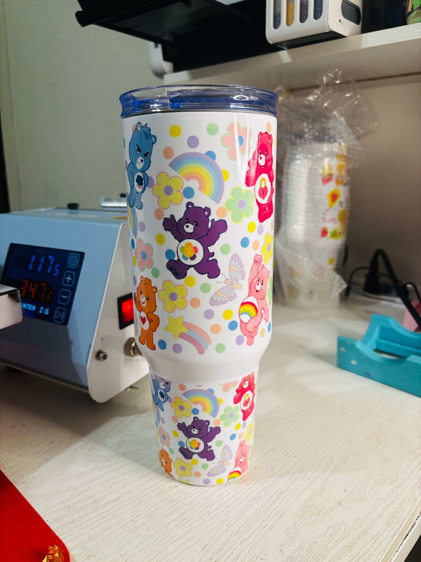 Flowers and rainbow carebears 40oz tumbler
