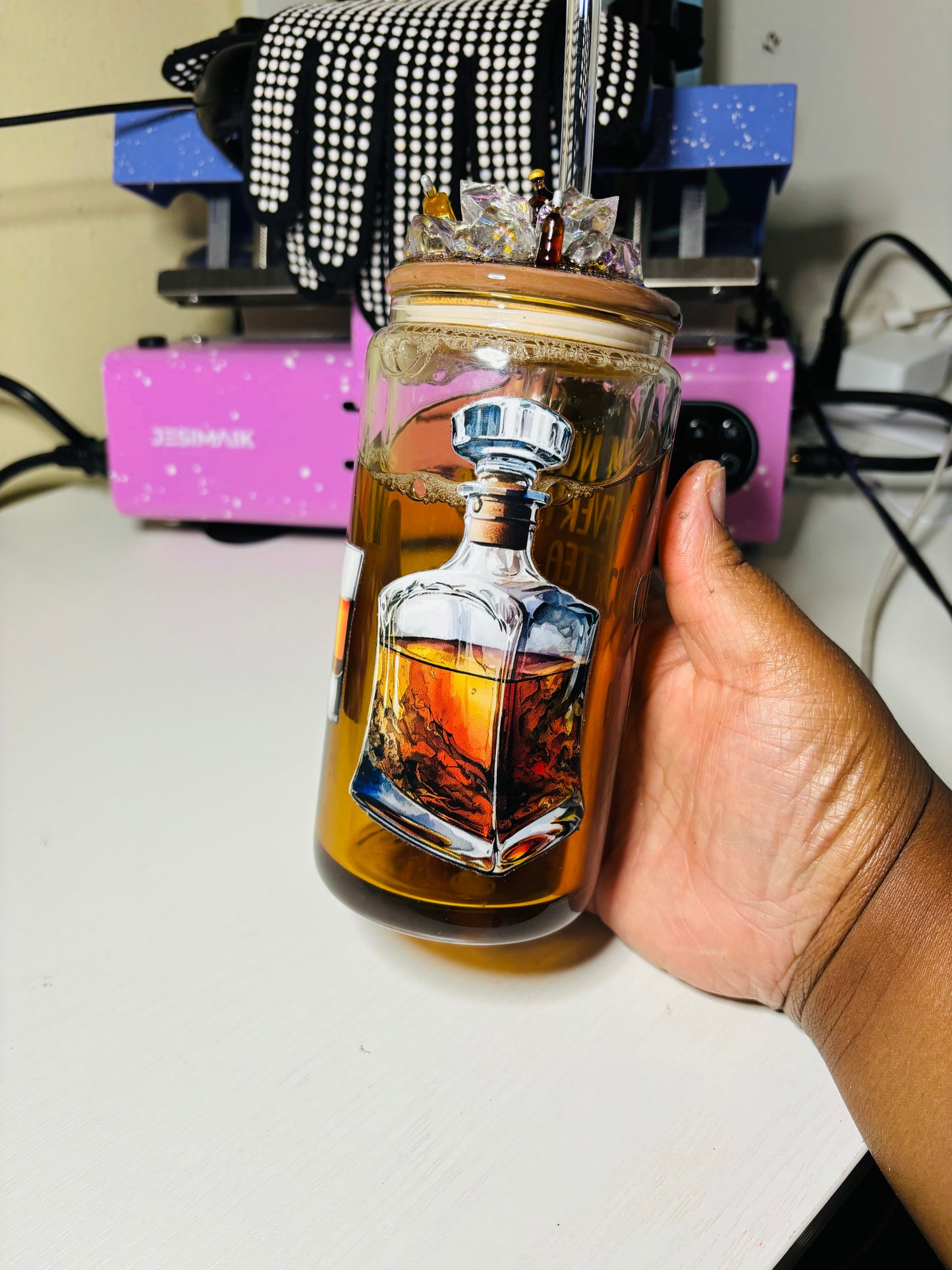 Someone’s whiskey snow globe cup
