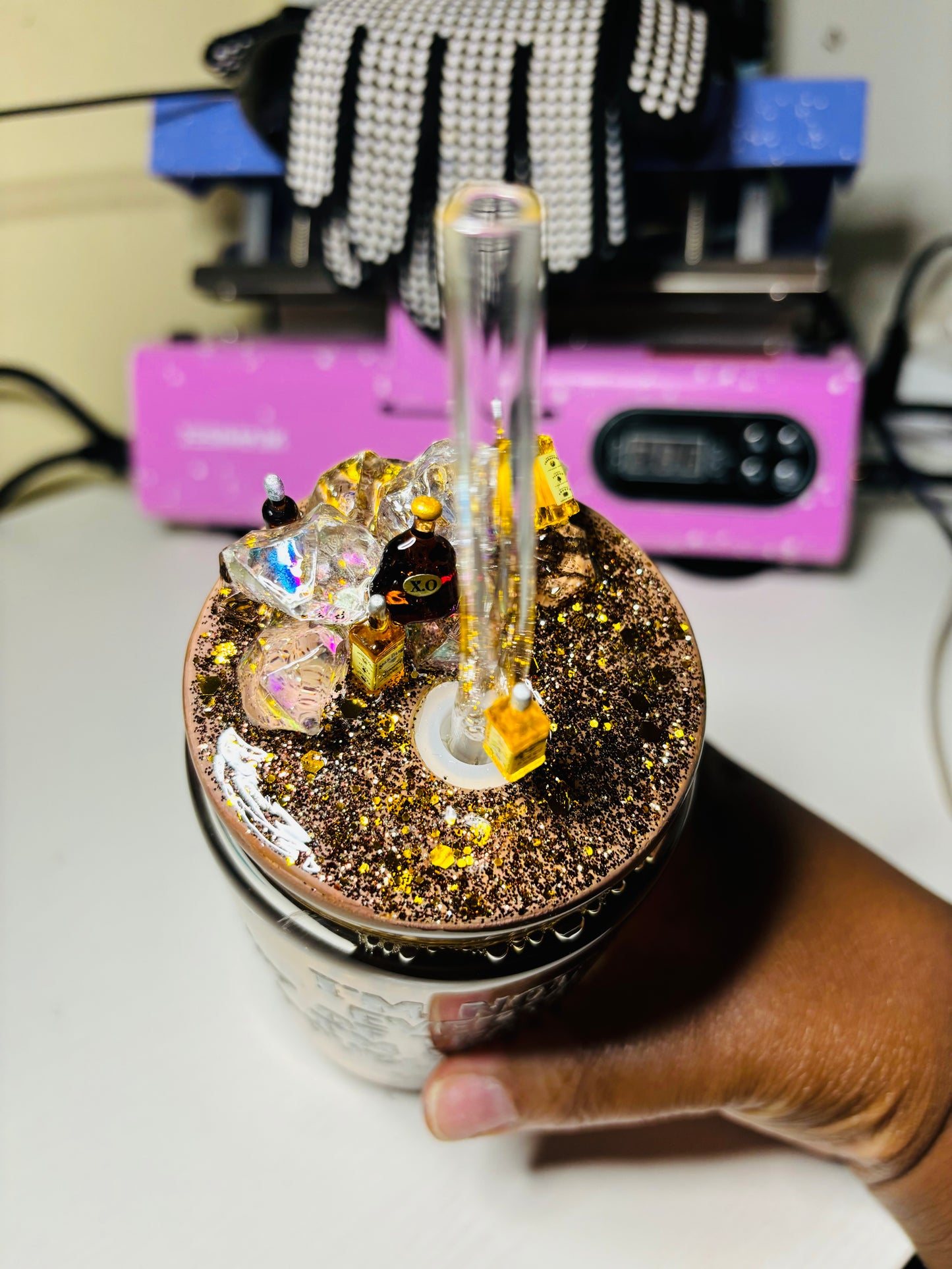 Someone’s whiskey snow globe cup