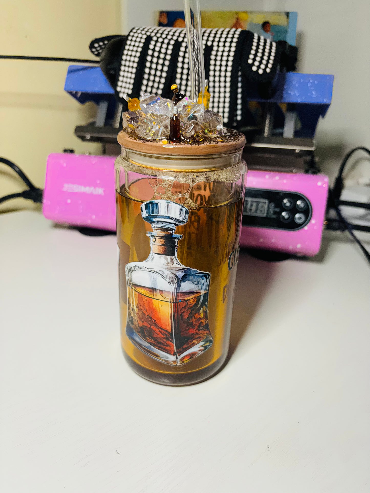 Someone’s whiskey snow globe cup
