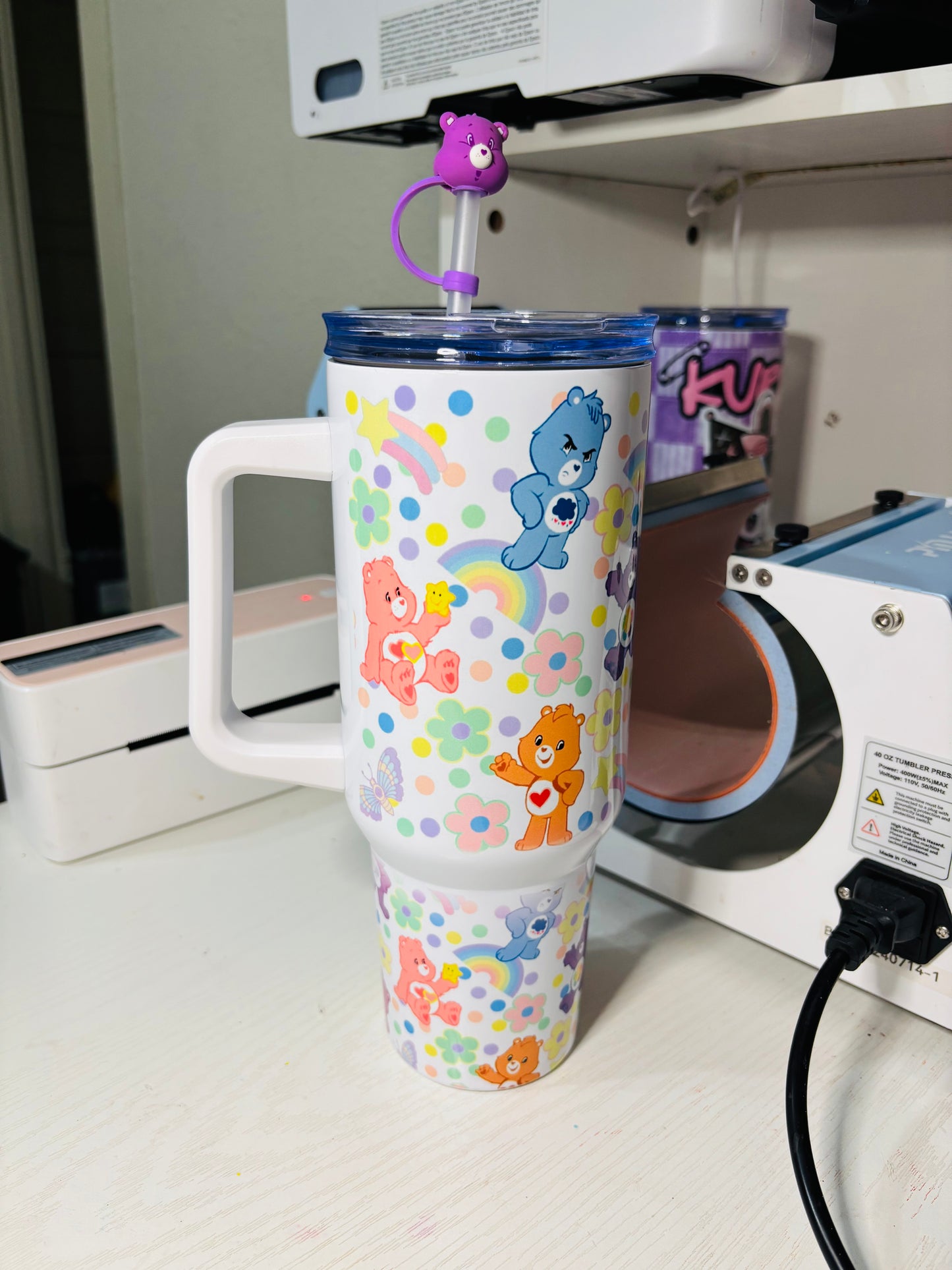 Flowers and rainbow carebears 40oz tumbler