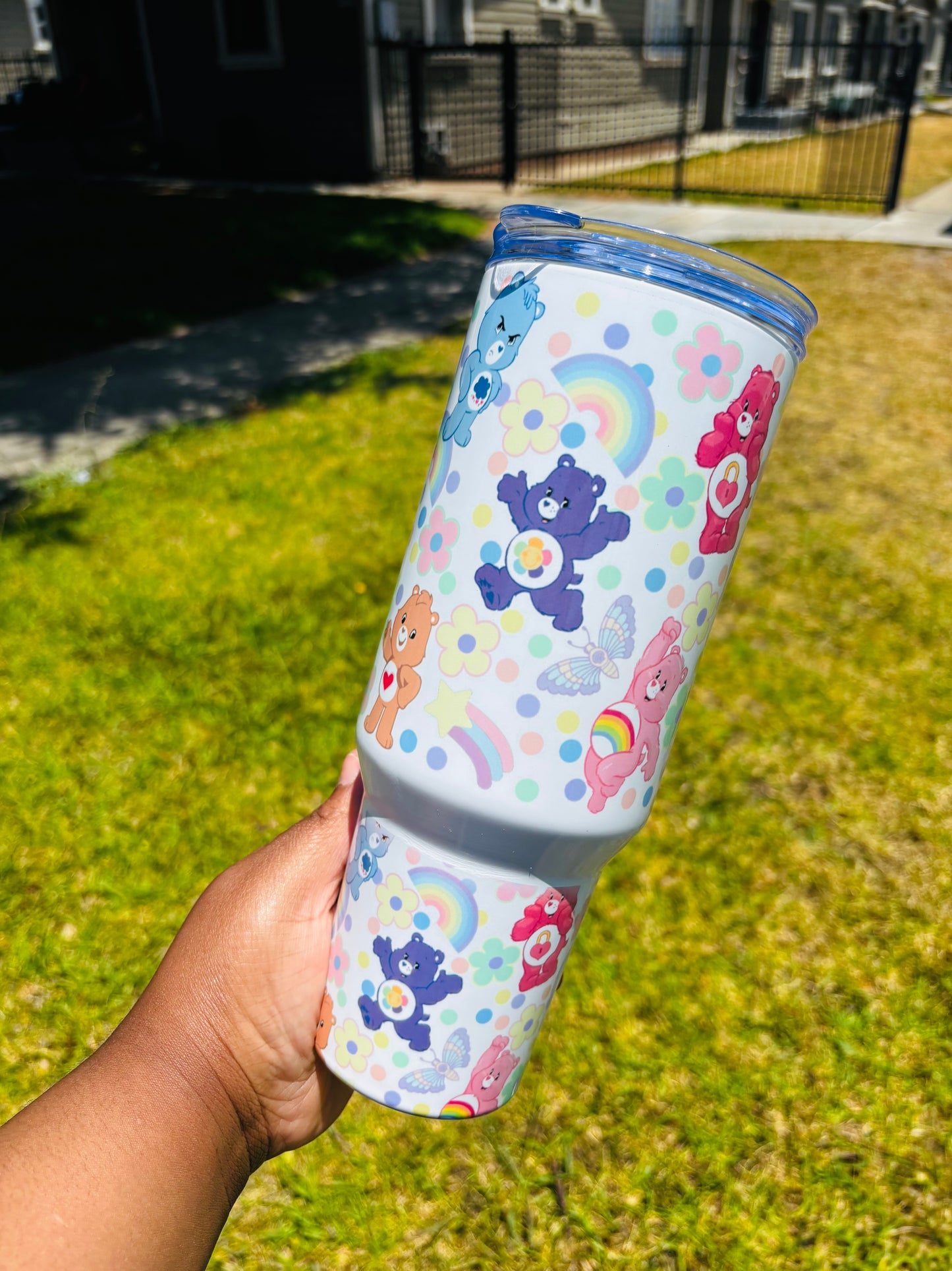 Flowers and rainbow carebears 40oz tumbler