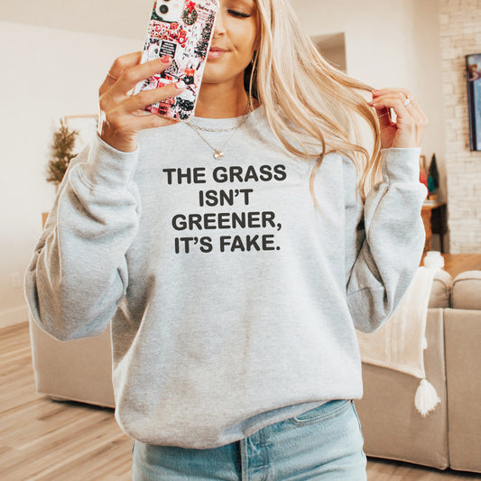 Grass isn’t greener Unisex Heavy Blend™ Crewneck Sweatshirt