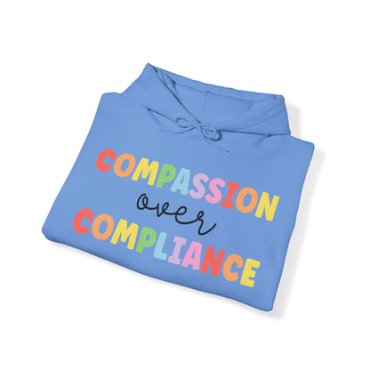 compassion over compliance Unisex Heavy Blend™ Hooded Sweatshirt