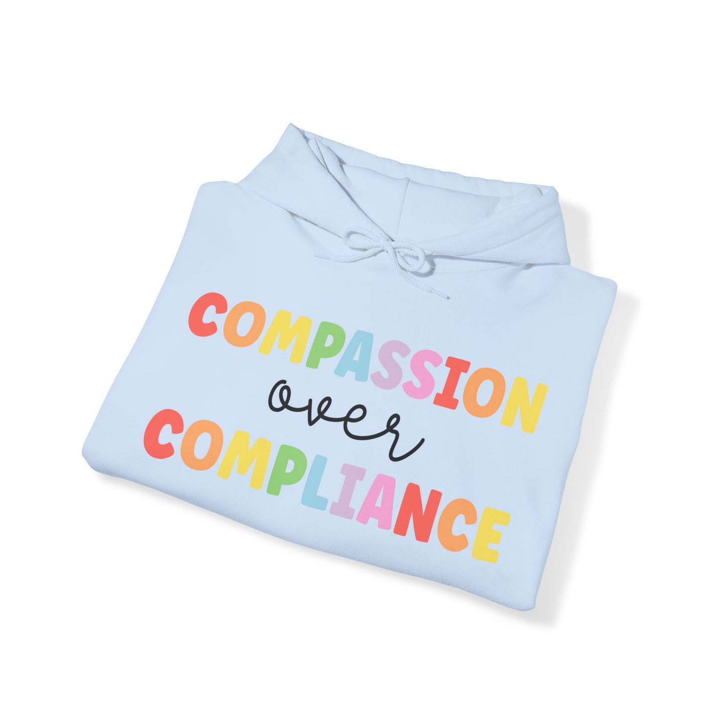 compassion over compliance Unisex Heavy Blend™ Hooded Sweatshirt